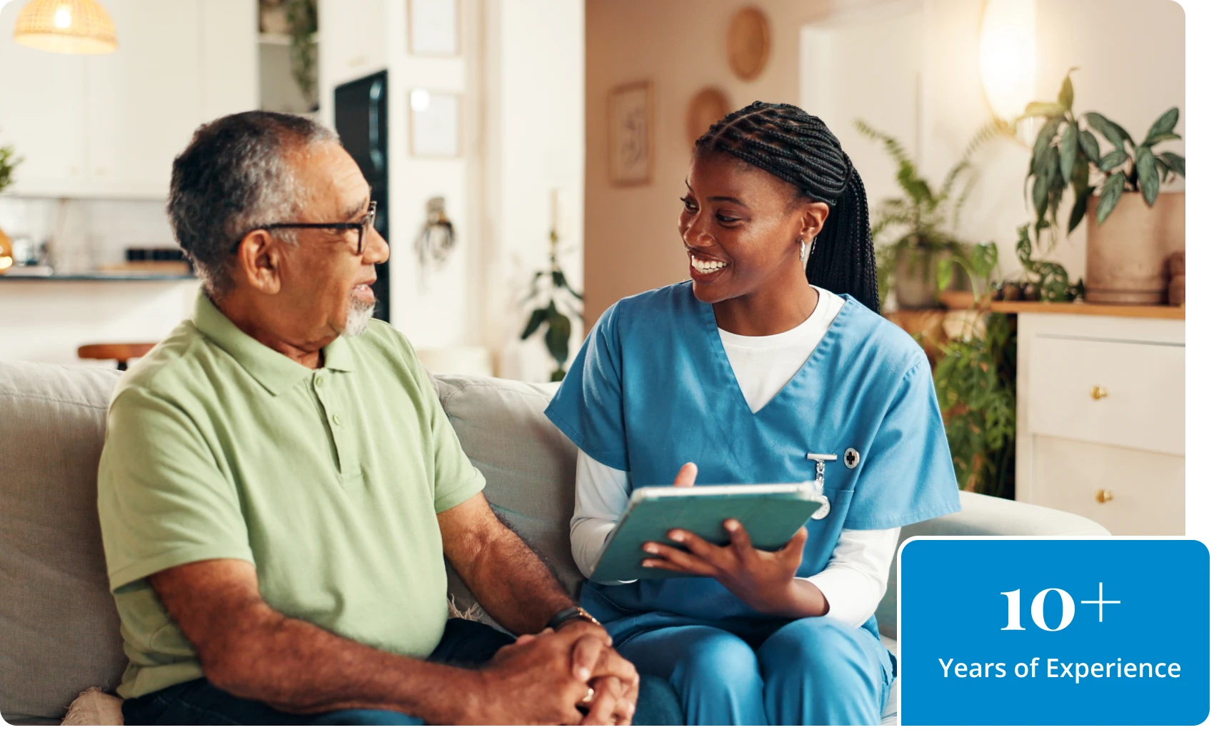 Nurse with patient on a sofa